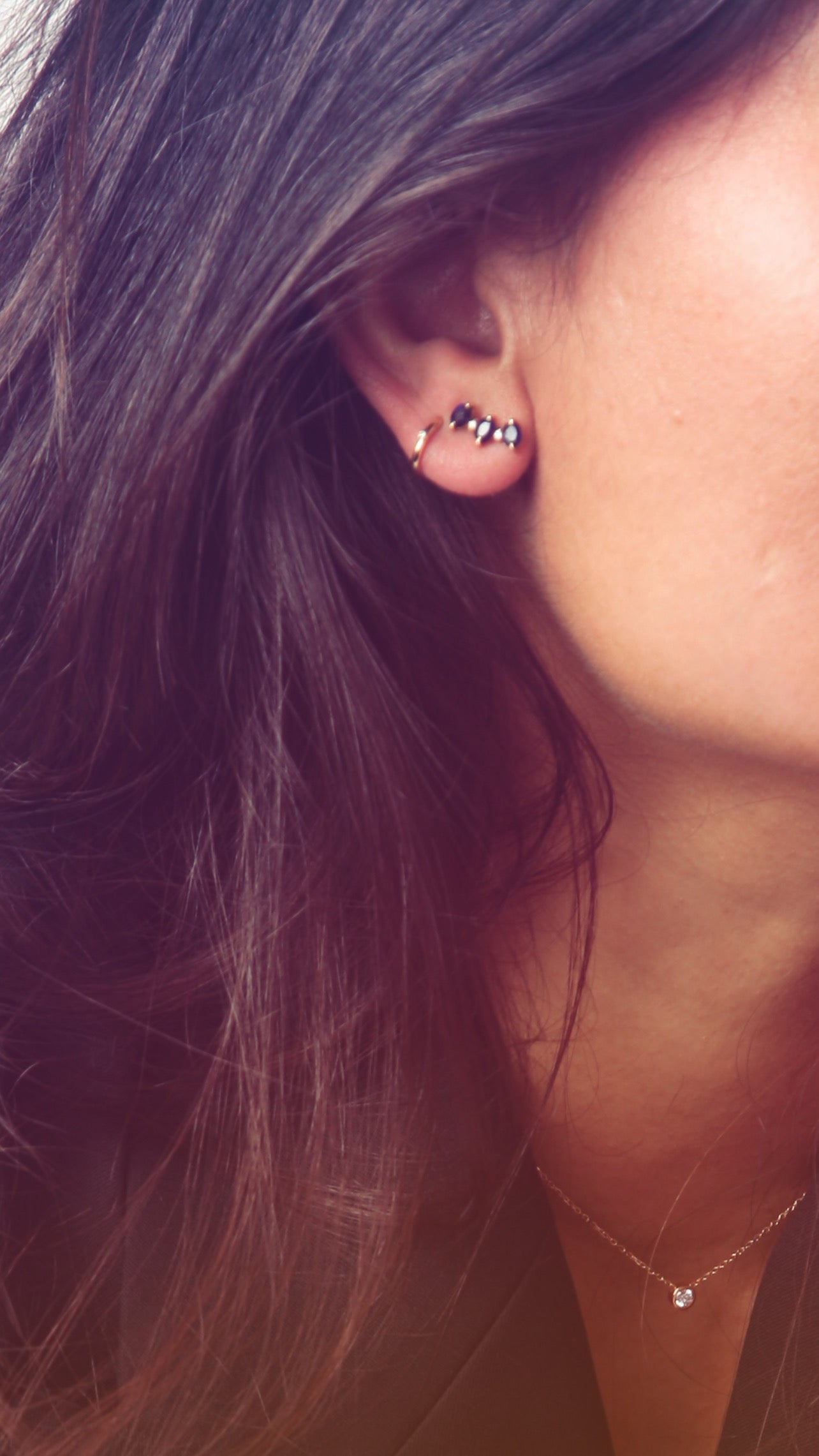 Geelgouden oorringen 10 mm buitendiameter en diamant 0,01 Cts. HSI2